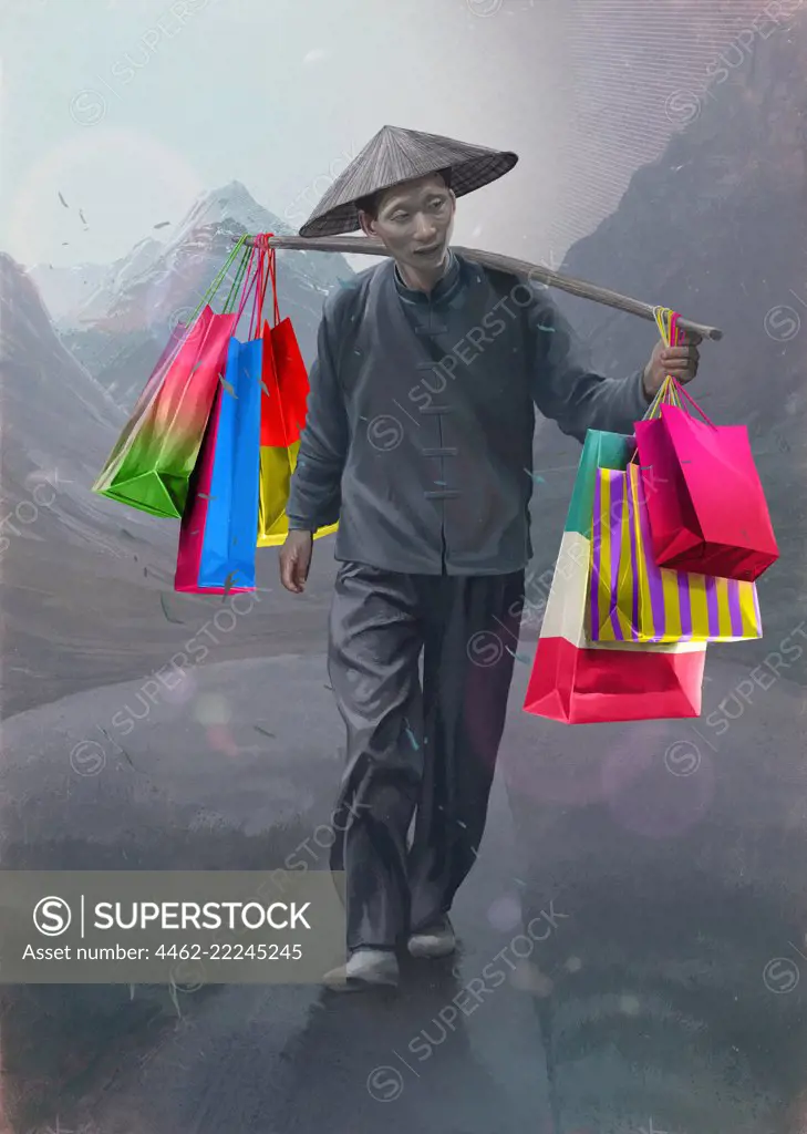 Man wearing traditional Asian clothing carrying colorful shopping bag on mountain road