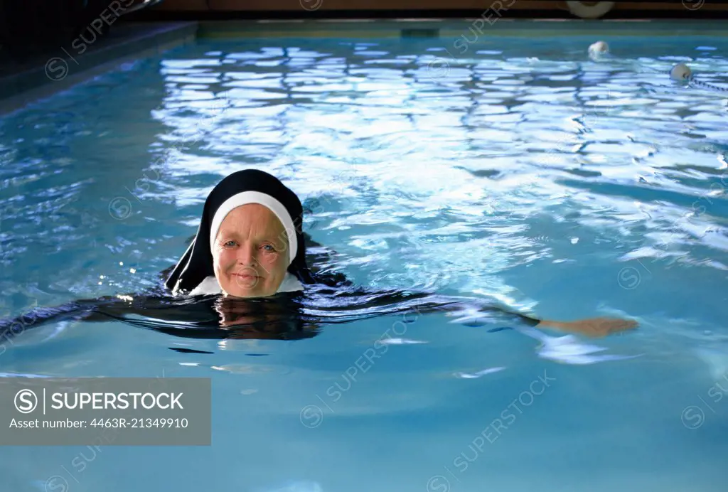 Nun swimming