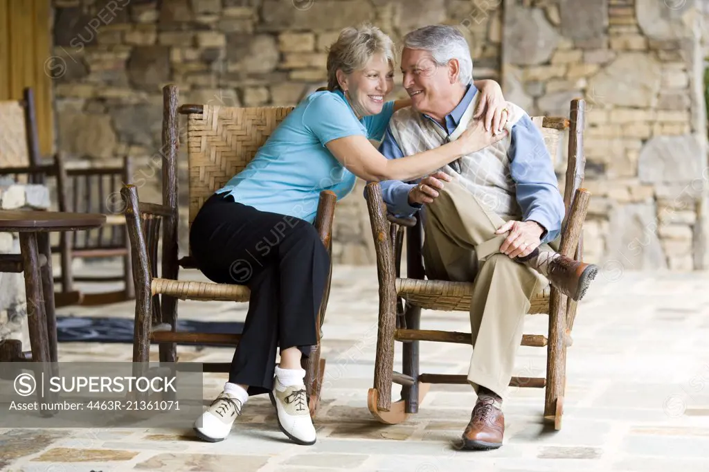 Older couple sitting in courtyard