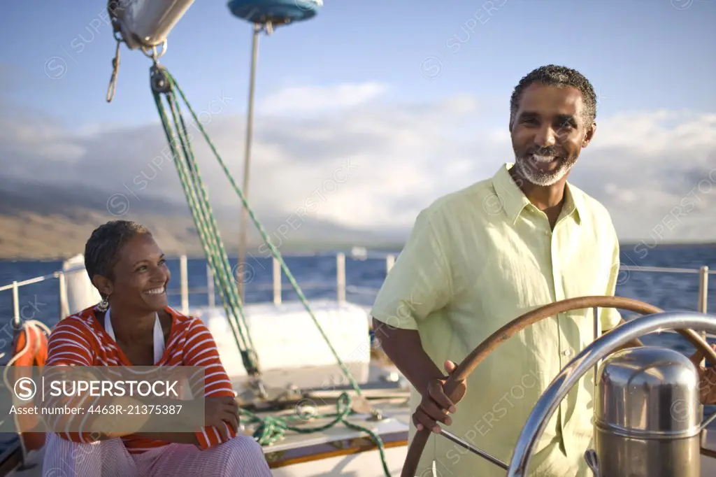 Couple on a yacht having fun.