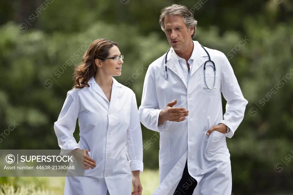 Portrait of male and female doctor. 
