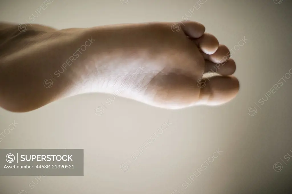 Sole of a bare male foot.