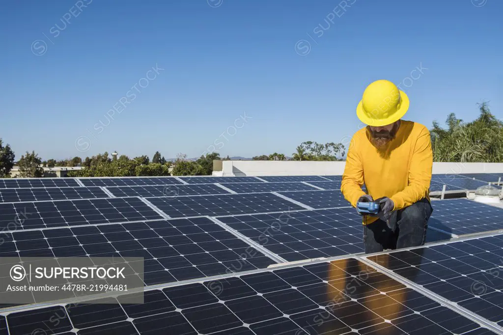Man Working With Solar Panel 