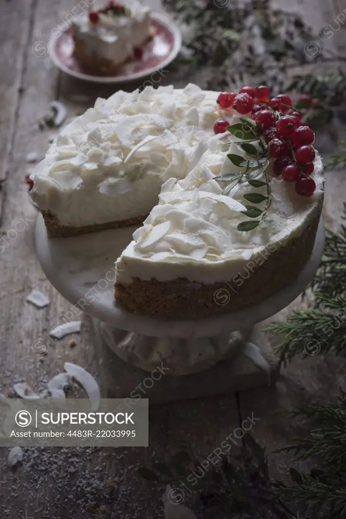 Coconut cheesecake in a rustic kitchen