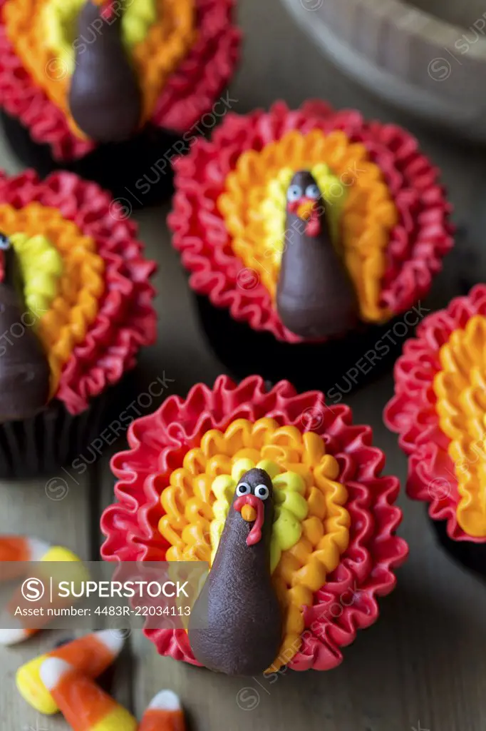 Cupcakes decorated with buttercream turkeys