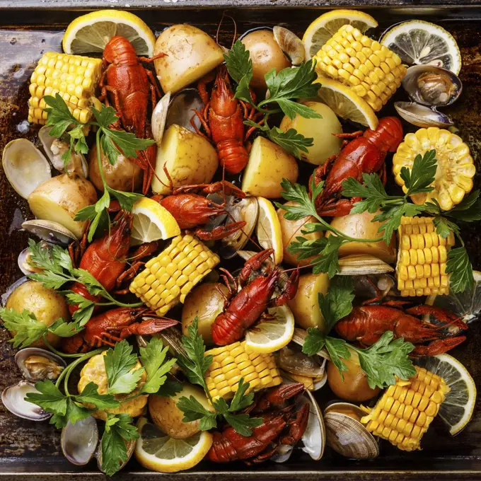 Clambake Seafood boil with boiled Crayfish, Corn on the Cob, Potatoes and Clams