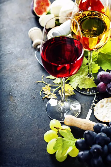 Food background with Wine, cheese and Grape.