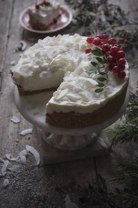 Coconut cheesecake in a rustic kitchen