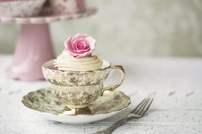 Rose cupcake in a vintage teacup