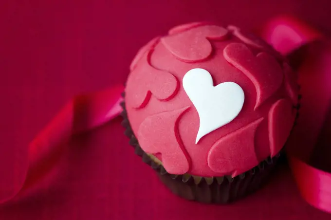 Cupcake decorated with fondant hearts