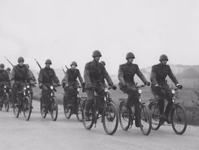1940s soldiers. The swedish army is being mobilized during the World War II. Soldiers are exercising prior a military parade and the formation of the cyclists must be perfect. Sweden 1940s