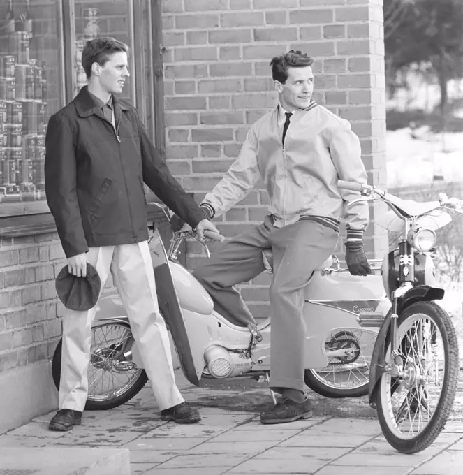Men's fashion in the 1950s. Described as motor fashion and suitable to use when driving mopeds and motorcycles.  Durable trousers and jackets. Sweden Febrary 1959