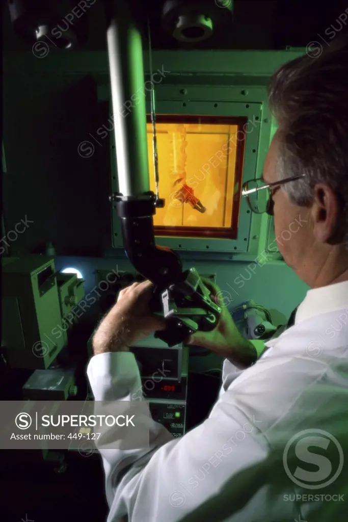 Placing Cell SamplesOnto Microscope StageChalk River Nuclear LabOntario, Canada