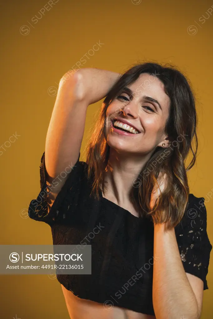 Portrait of cheerful delighted woman