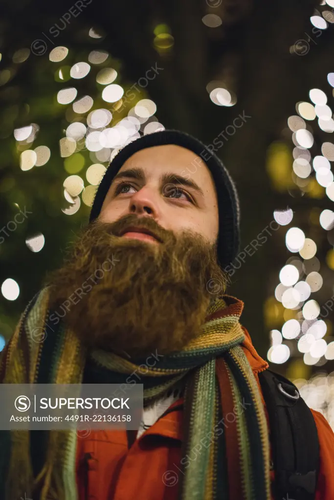 Handsome man posing at lights