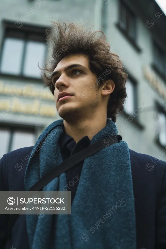 Young man posing on street