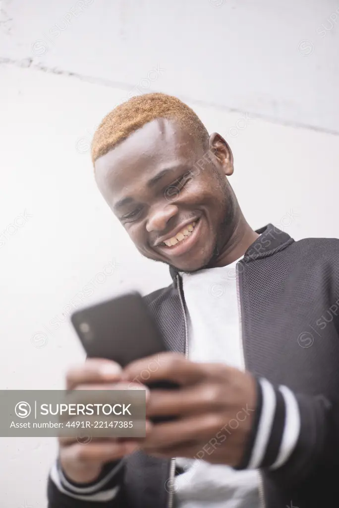 African american man making himself selfie portrait of smart phone