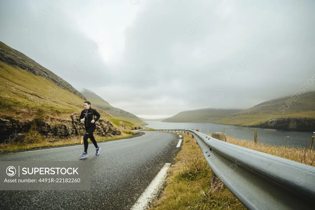 Person running on rural road