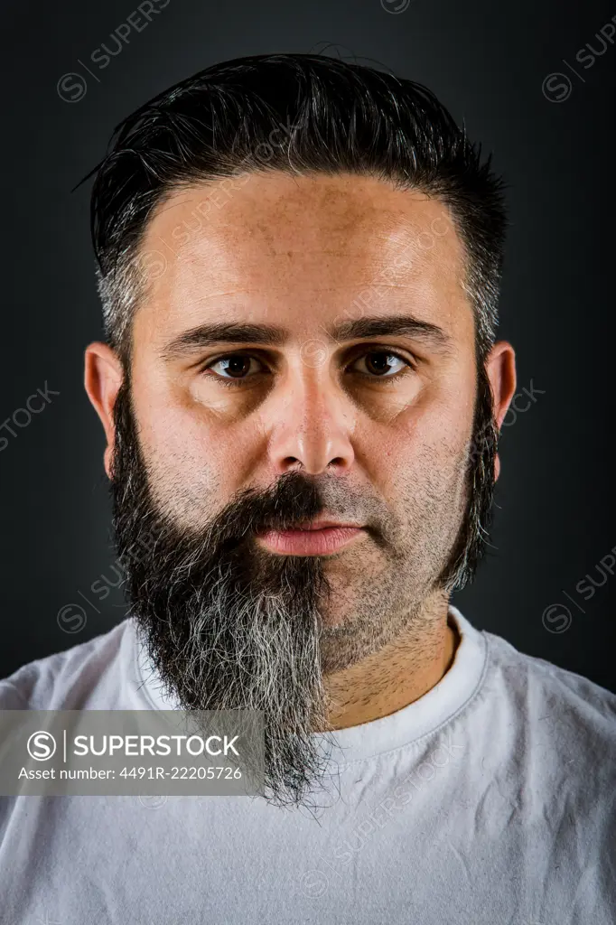 Confident man with half beard