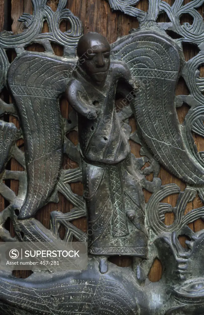 Italy, Verona San Zeno Maggiore, close up of Archangel, bronze