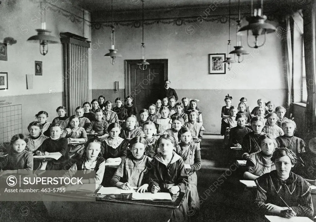 High angle view of girls sitting in a classroom, c. 1905