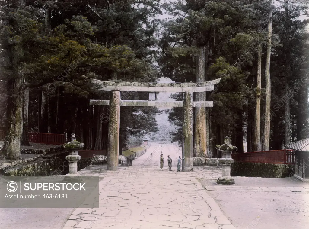 Walkway passing through a torii gate, Nikko, Japan, c.1900