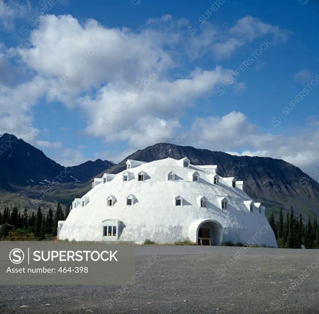 Igloo shape building in front of mountains, Alaska, USA