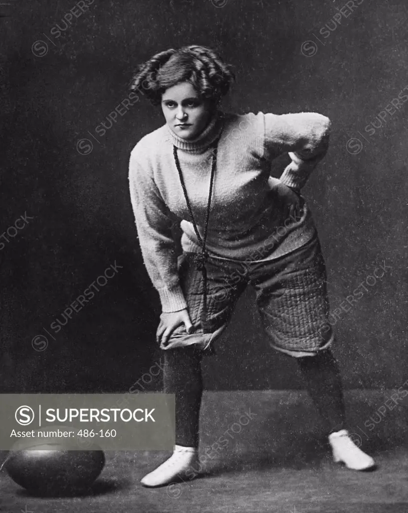 Mid adult woman standing in a gym