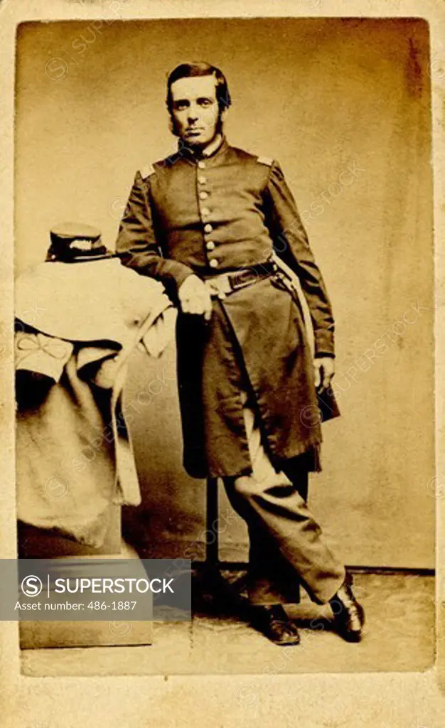 Portrait of young man wearing Civil War Uniform