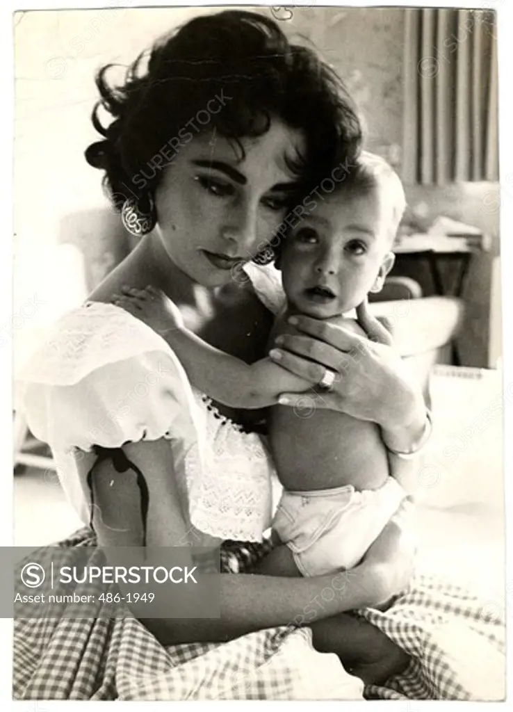 Portrait of Elizabeth Taylor with child