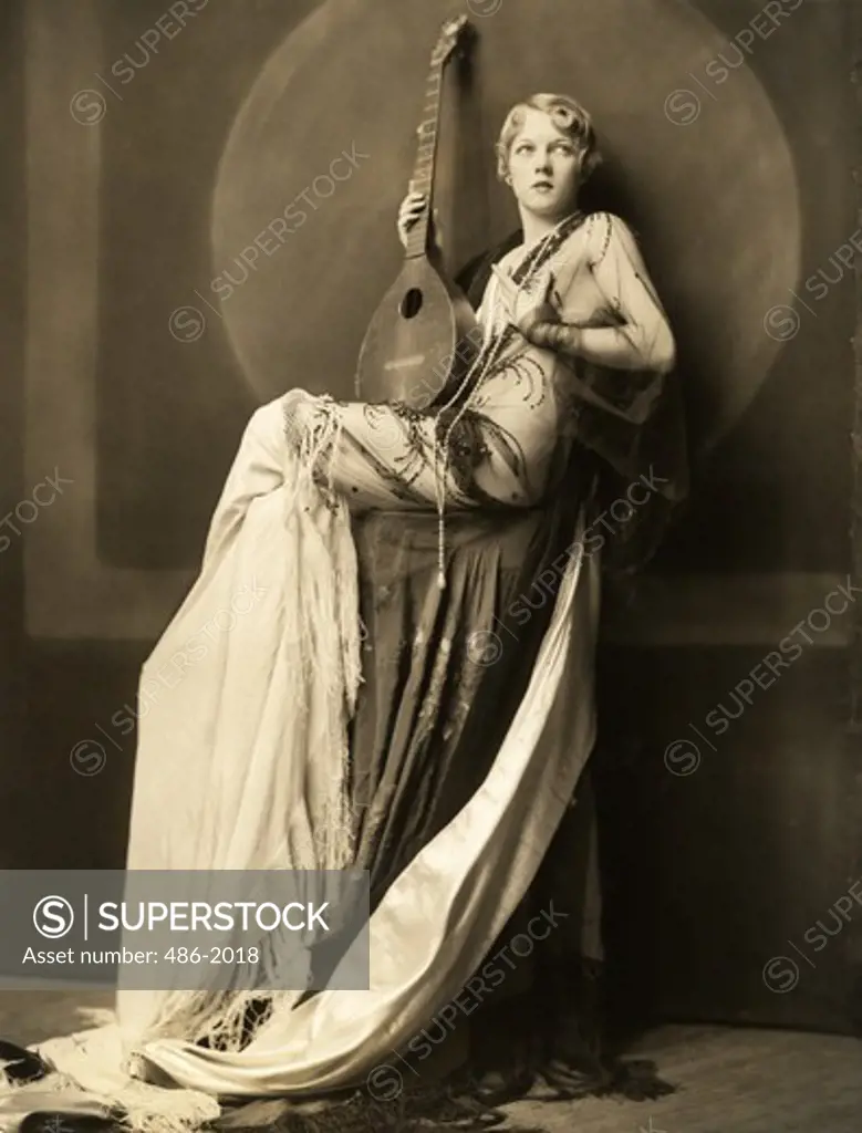 Portrait of woman with mandolin