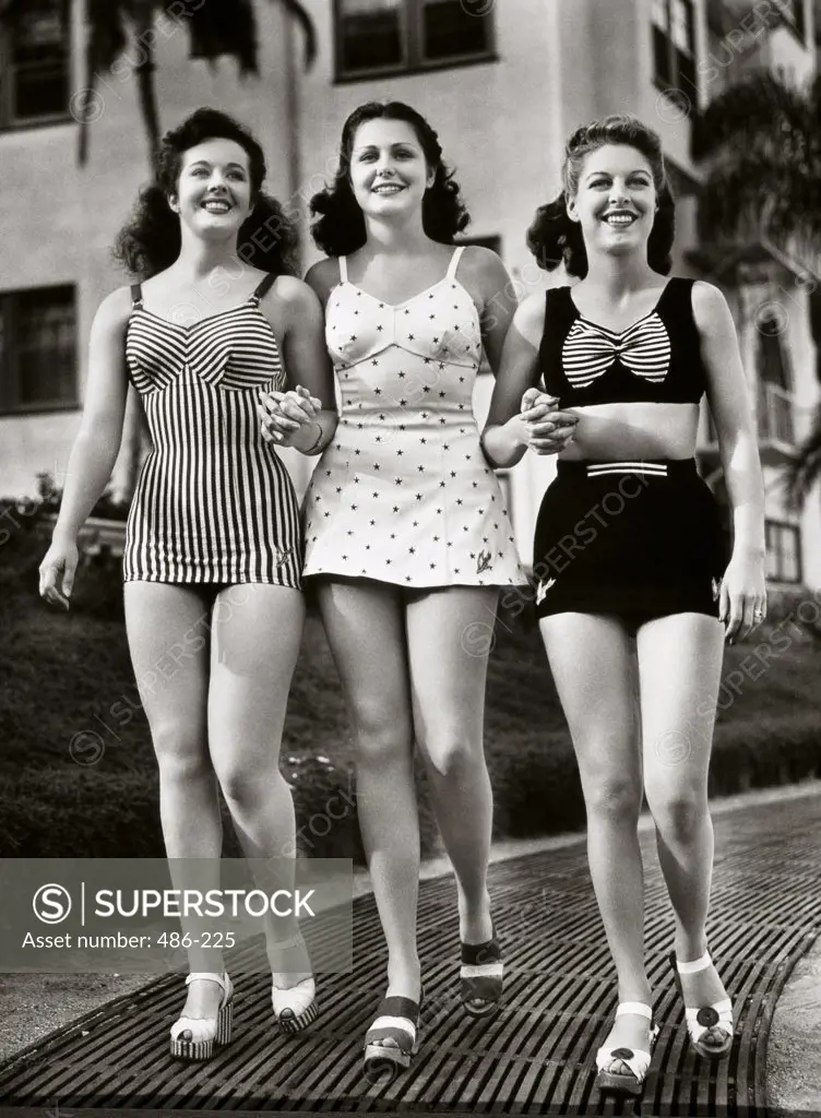 Three young women walking together