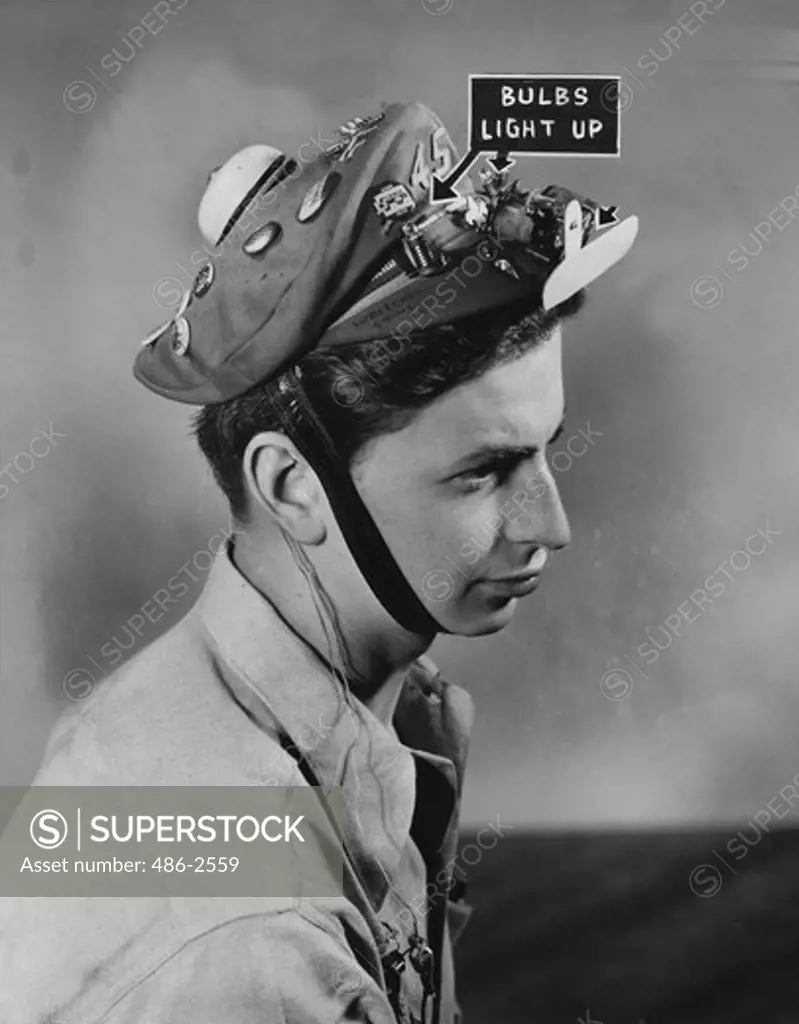 Portrait of teenage boy wearing funny cap