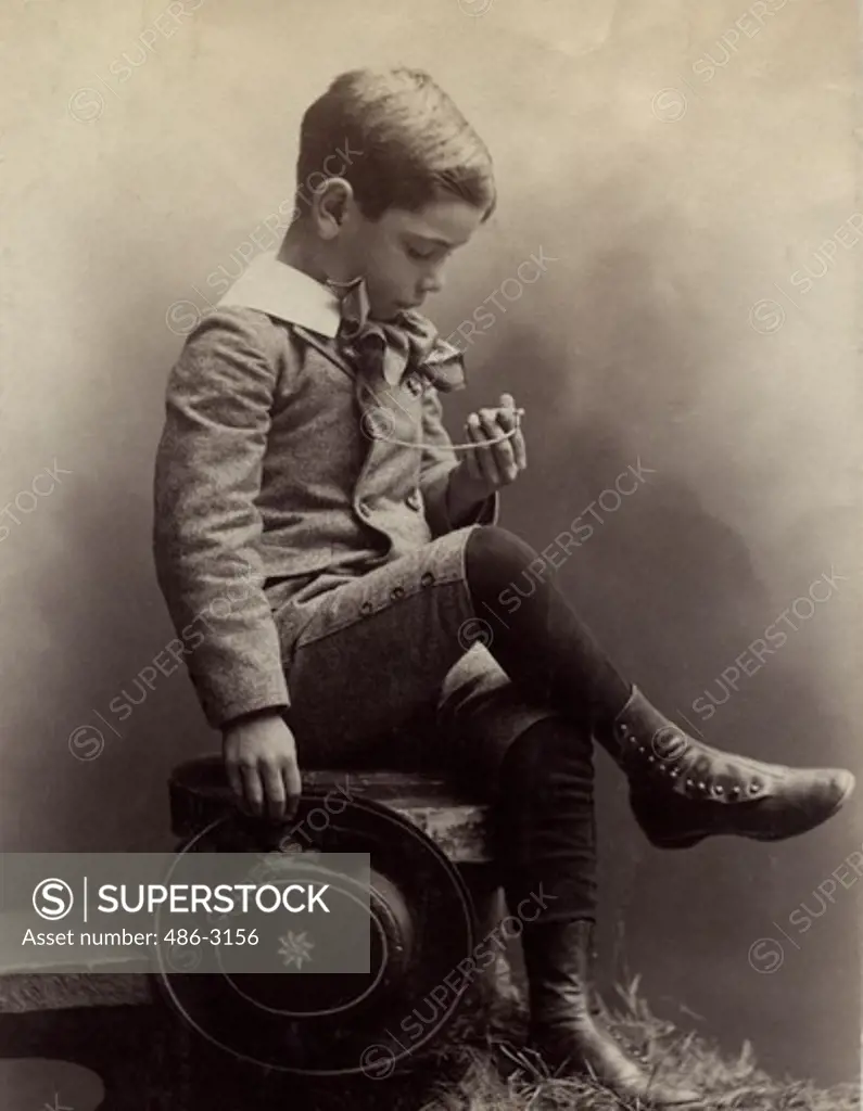 Portrait of boy with pocket watch, 1893