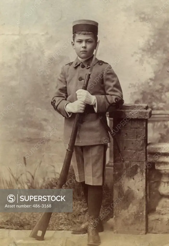 Portrait of boy dressed as soldier, 1897