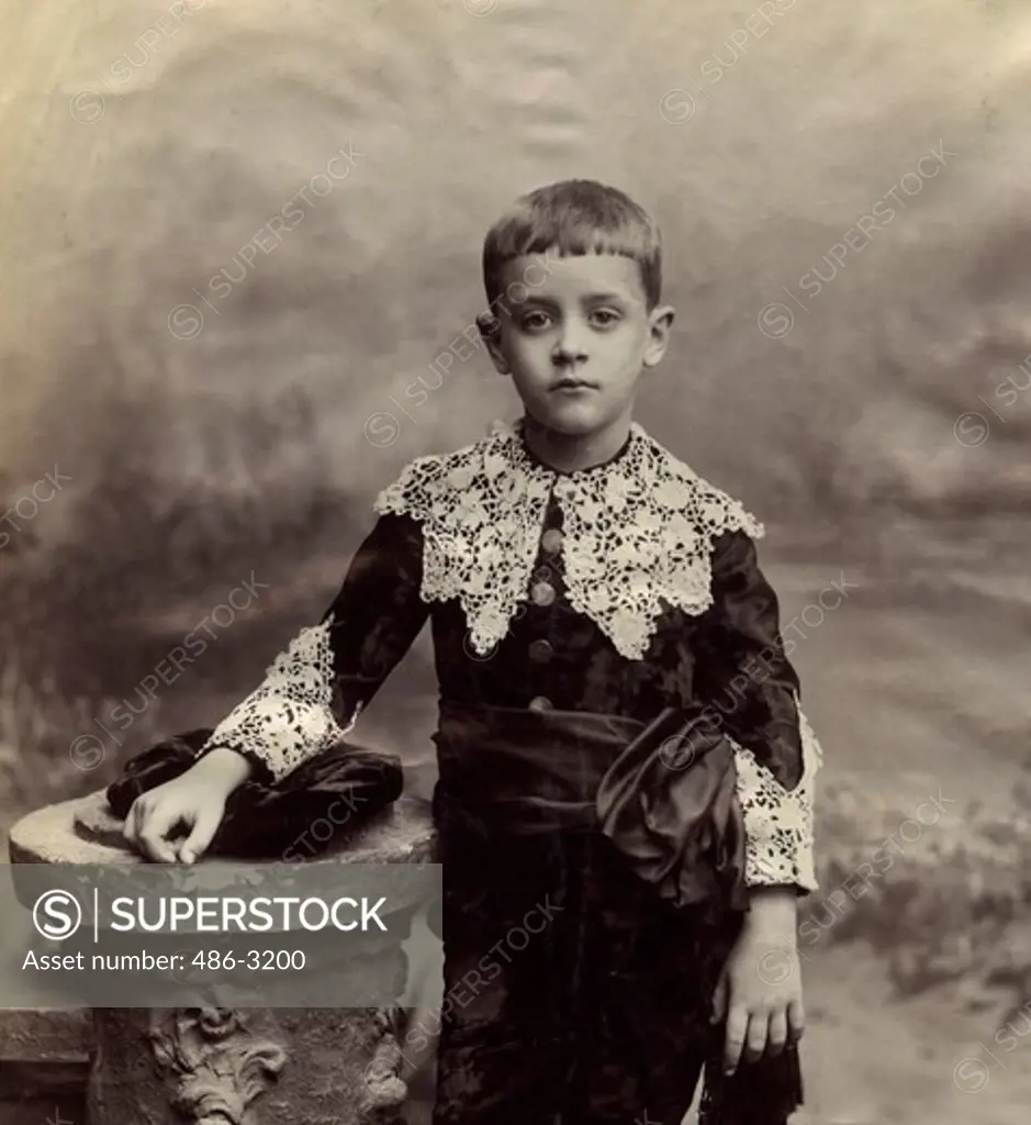 USA, Rhode Island, Newport, Portrait of boy in elegant embroidered outfit, 1890