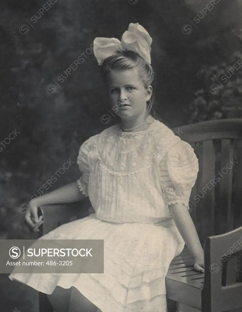 USA, Rhode Island, Newport, Portrait of girl with hair bow, 1908