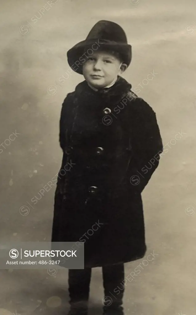 USA, New York, New York City, Portrait of boy wearing coat, 1909