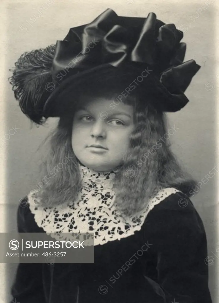 USA, New York, New York City, Portrait of girl wearing dress hat, 1901