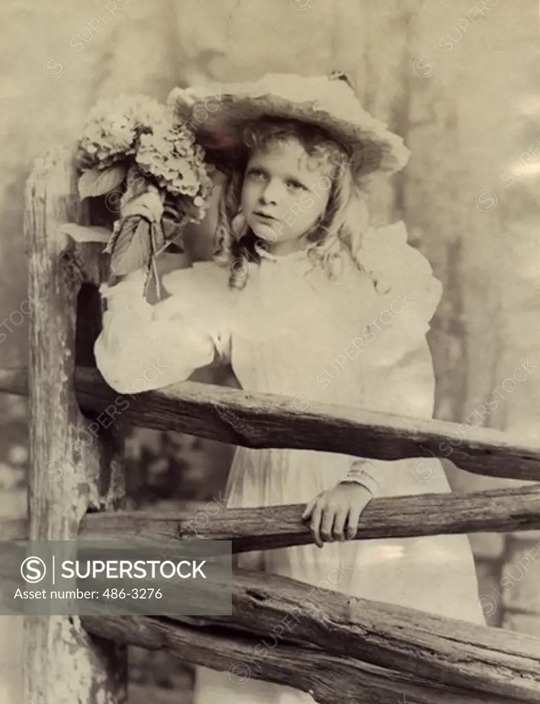 USA, Rhode Island, Newport, Portrait of girl holding bouquet, 1891