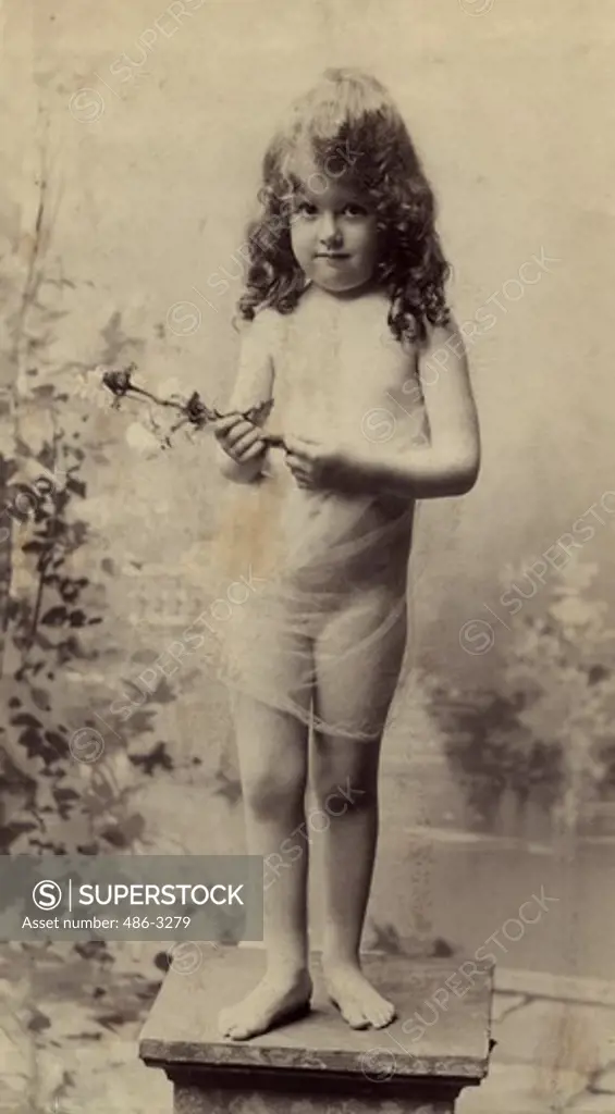 USA, Rhode Island, Newport, Portrait of girl holding flower, 1891