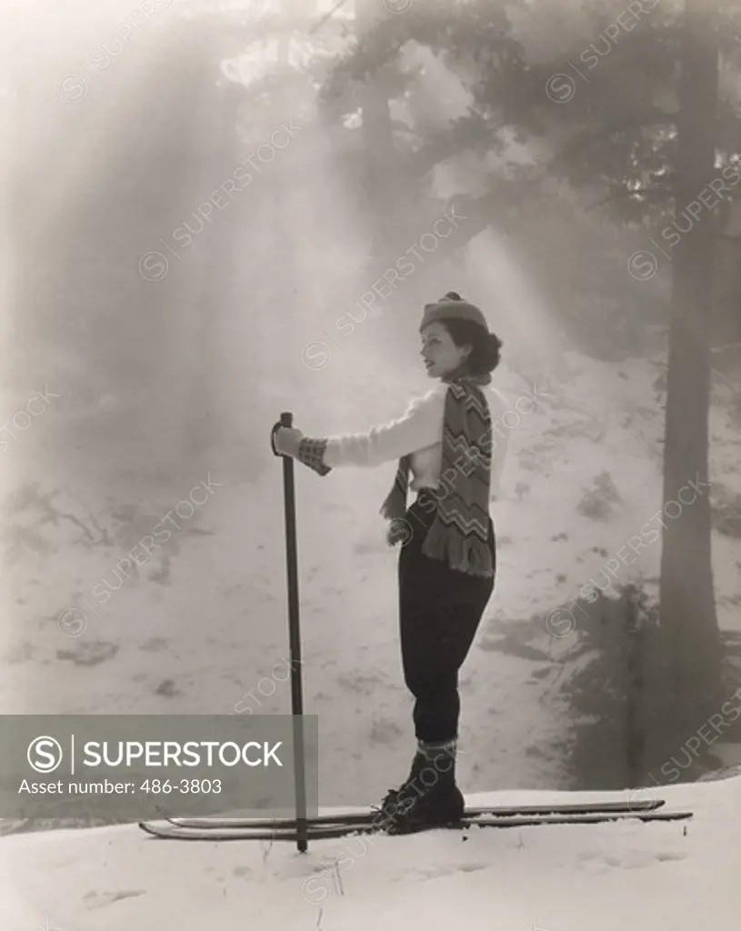 Portrait of June Travis skiing
