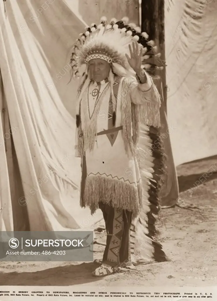 Chief Thunder Bird in role of Chief Sitting Bull, famed Indian chieftain of yesterday in ""Annie-Oakley"", RKO Radio's thrilling film built around the colorful life of the greatest woman sharpshooter of all time. Barbara Stanwyck is starred as Anie.