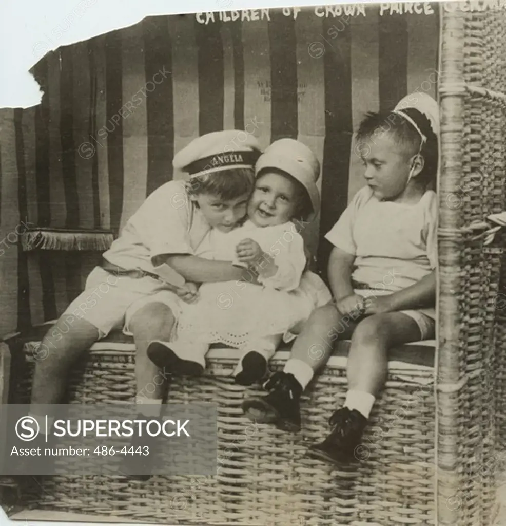 Children of Crown Prince of Germany sitting in beach basket