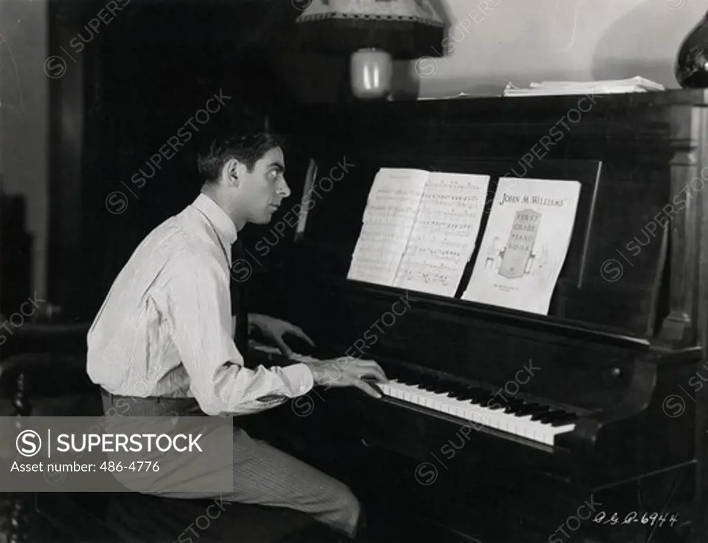 Eddie Cantor playing piano