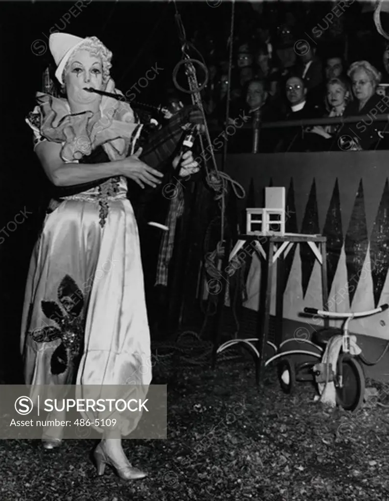 View of Lulu, clown from Ringling circus, Lulu, only female clown with the Ringling circus now at the garden, carries on although her husband, Albertino, also clown, collapsed and died the night before the circus opened