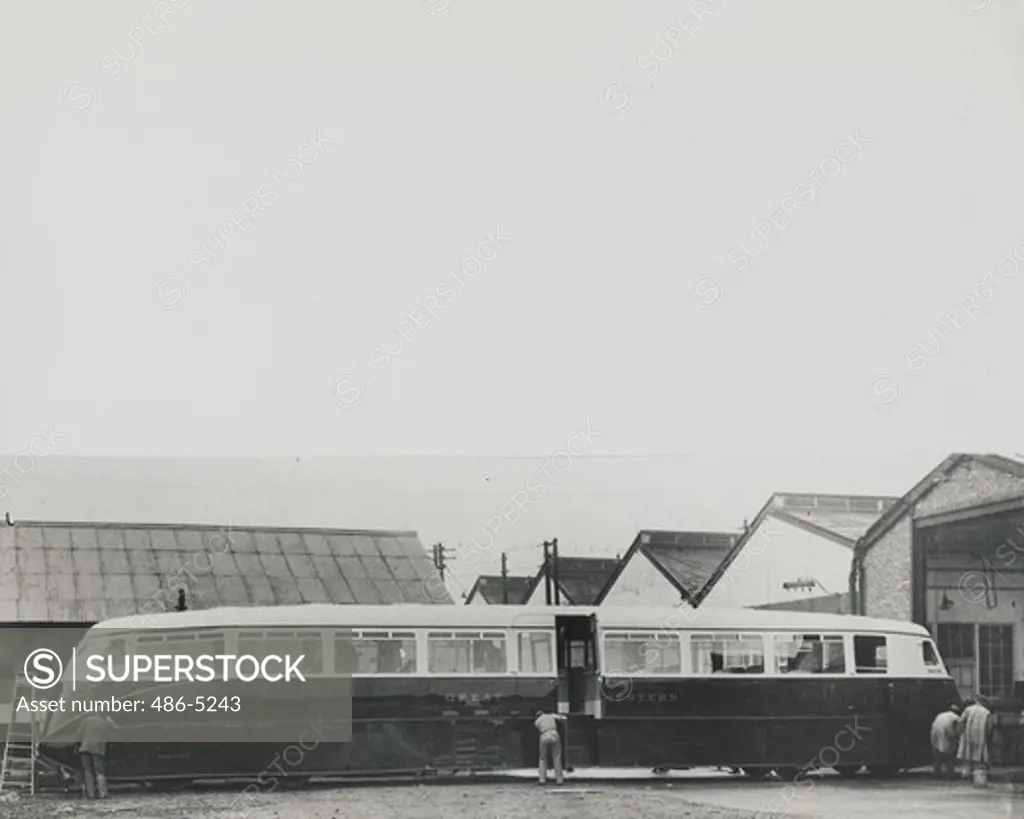 UK, Broadside view of great Britain's first streamlined railroad car, 1933, Broadside view of great Britain's first streamlined railroad car which shortly will be introduced by the Great Western Railway on its suburban services between reading and slough. It is of unique sign and is specially built to reduce wind resistance. Resembling a huge seaplane float, the car has a seating capacity of 69, is capable of a maximum speed of 60 miles an hour and is driven by 130h.p. heavy oil engines, 1933