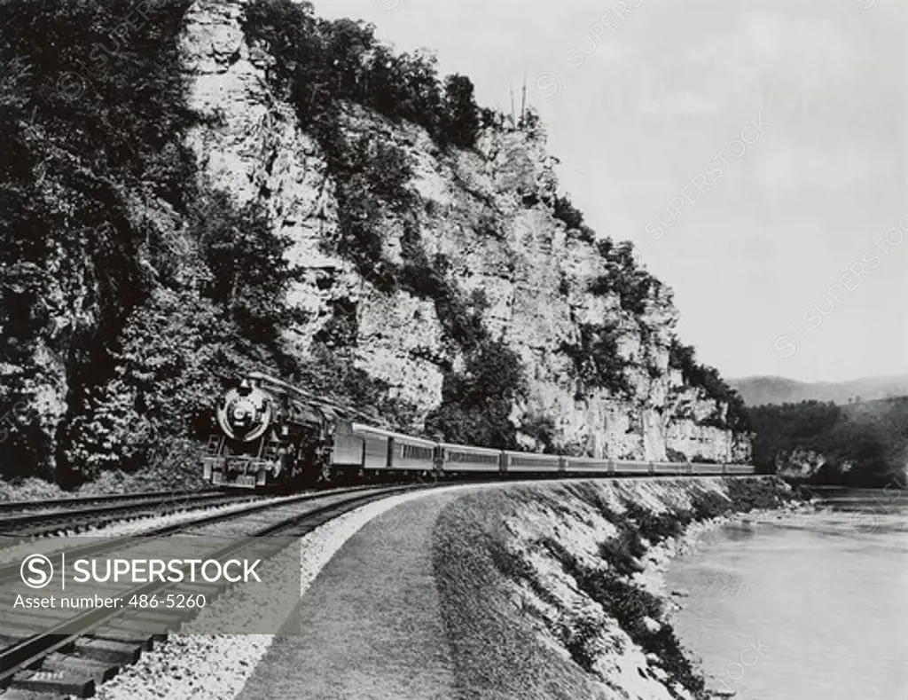 USA, Virginia, Norfolk and Western's famed ""Pocahontas"", all steel completely air-conditioned crack passenger train, passing Palisades along New River