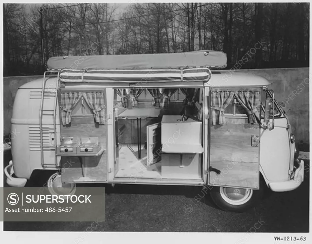 Volkswagen Campmobile, 1963 with interior including seats which convert into full-size double bed, Icebox, 14-gallon water tank with pump and swivel spigot, Clothes closet, Food storage compartments