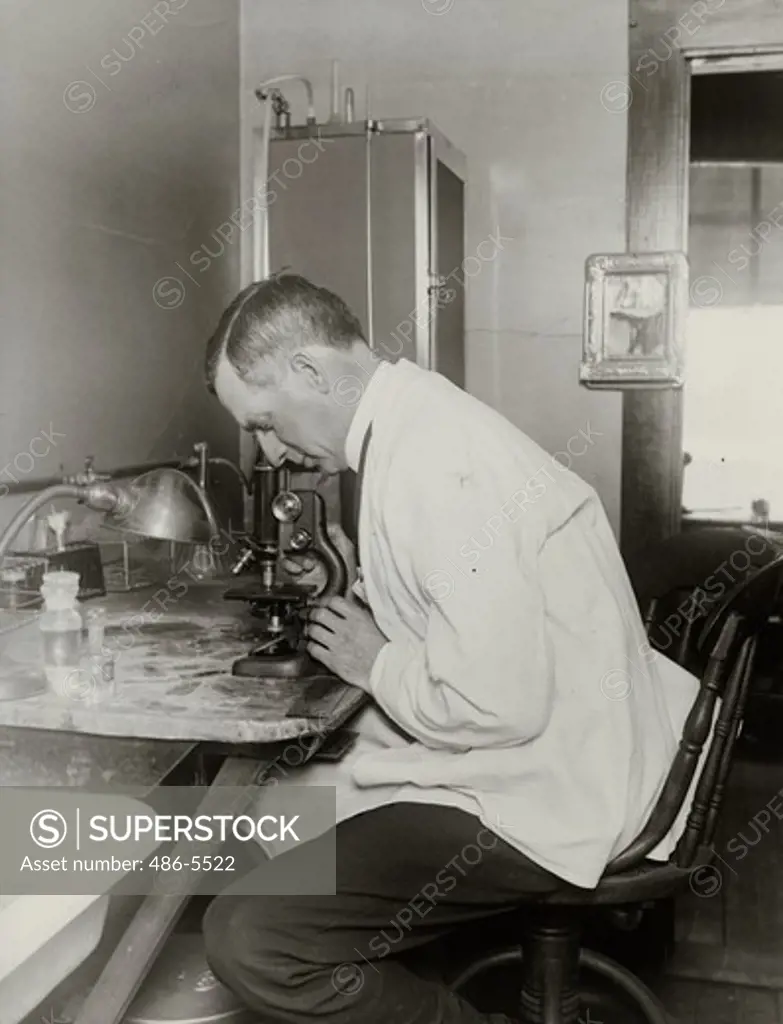 Scientist working in his lab